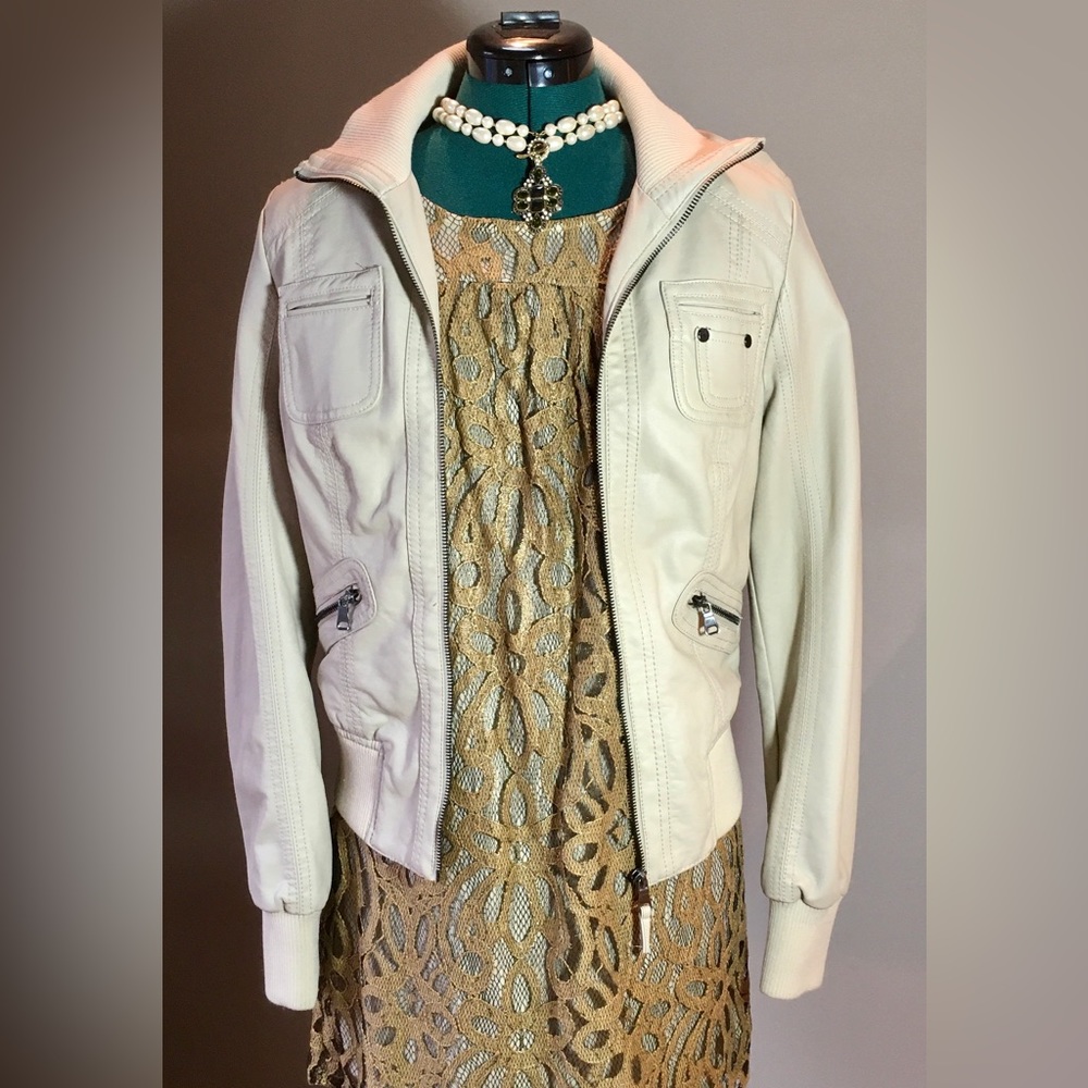 Ivory faux leather moto jacket. Size S/M NWOT. Eco-friendly attire for climate